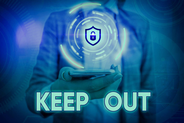 Signo de texto que muestra Keep Out. Foto conceptual para mantenerse alejado de un objeto o evento que puede tener un alto riesgo de peligro
. - Foto, imagen