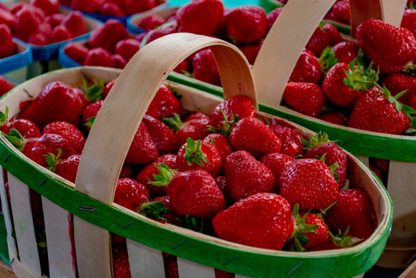 Fresh ripe sweet French strawberry in wooden basket, new harvest - Photo, Image