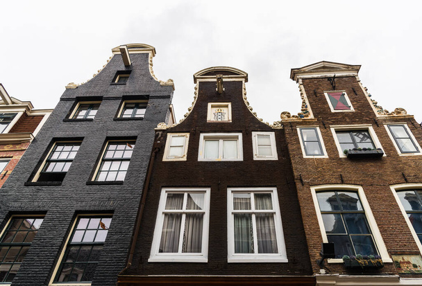 Traditional Dutch architecture colorful houses in Amsterdam, Netherlands - Фото, изображение