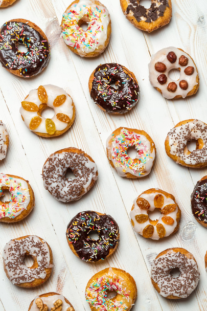 Group of different colorful donuts - Foto, Bild