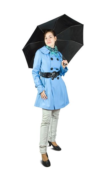 Girl in cloak with umbrella - Фото, изображение