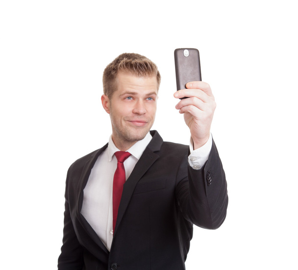 Handsome businessman taking a selfie - Foto, immagini