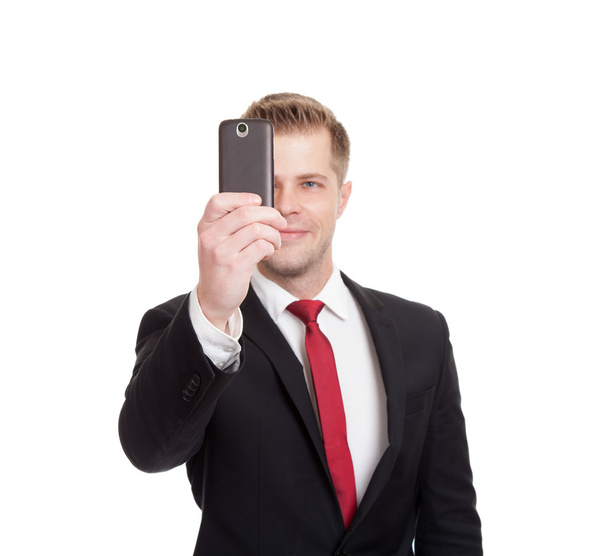 Handsome businessman taking a selfie - Foto, imagen