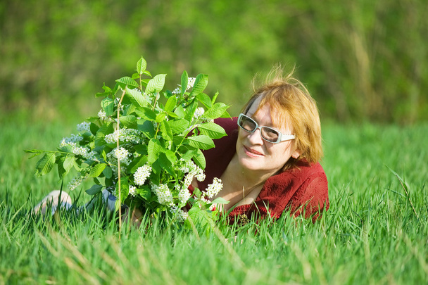 Woman in the spring meadow - Φωτογραφία, εικόνα
