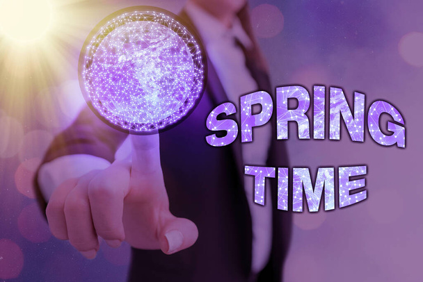 Conceptual hand writing showing Spring Time. Business photo text temperate season of the year identified by a revival of plants Elements of this image furnished by NASA. - Photo, Image