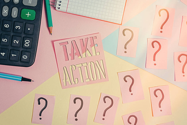 Text sign showing Take Action. Conceptual photo positive act of making a decision to resolve the problem Mathematics stuff and writing equipment above pastel colours background. - Photo, Image