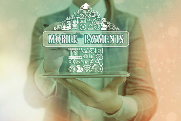 Pismo odręczne Mobile Payments. Koncepcja oznaczająca transakcję finansową przetwarzaną za pośrednictwem smartfona. - Zdjęcie, obraz
