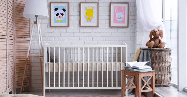 Baby room interior with comfortable crib. Banner design - Photo, Image