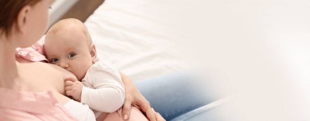 Young woman breast feeding her little baby, space for text. Banner design - Foto, Imagem