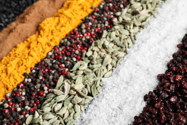 Many different spices as background, closeup view - Foto, imagen