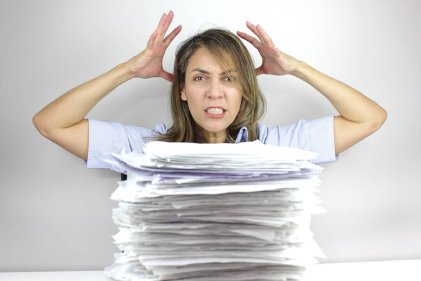 Business woman angry at all the paperwork - Photo, Image