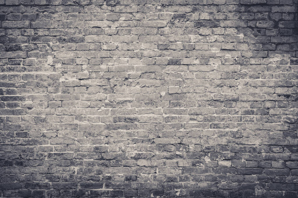 old vintage and grunge red brick wall background texture with scratches and cracks in black and white color, greyscale tone - Photo, Image