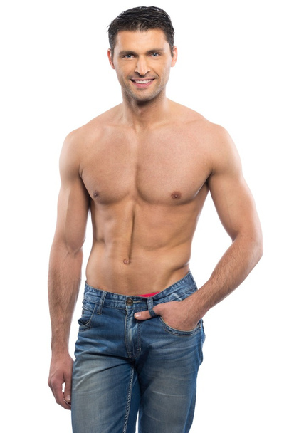 Joven guapo en jeans azules con torso desnudo
 - Foto, Imagen