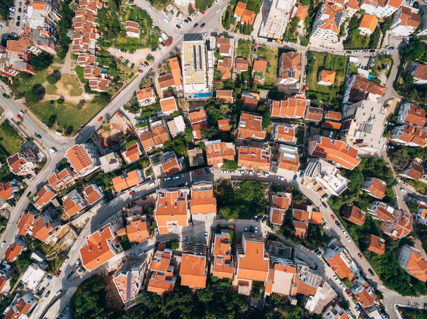 The modern city of Budva, from a birds-eye view, aerial photo from a drone, top view.  - Φωτογραφία, εικόνα