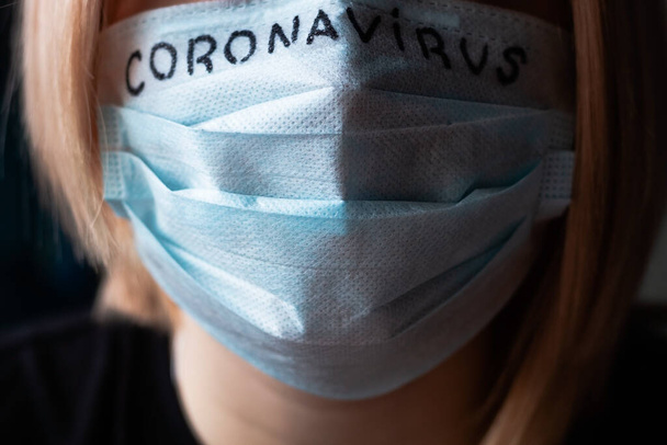 girl in an antiviral mask. stop coronavirus concept - Foto, Imagen