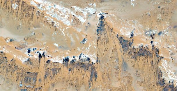ghost castle, abstract photography of the deserts of Africa from the air, aerial view of desert landscapes, Genre: Abstract Naturalism, from the abstract to the figurative, contemporary photo  - Photo, Image