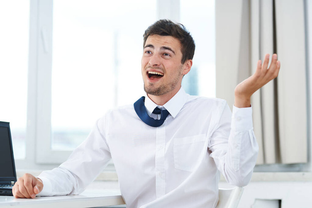 Young  happy  businessman   in the office  - Photo, image