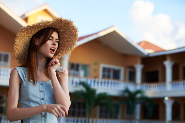   Young woman in straw hat on tropical resort  - Φωτογραφία, εικόνα