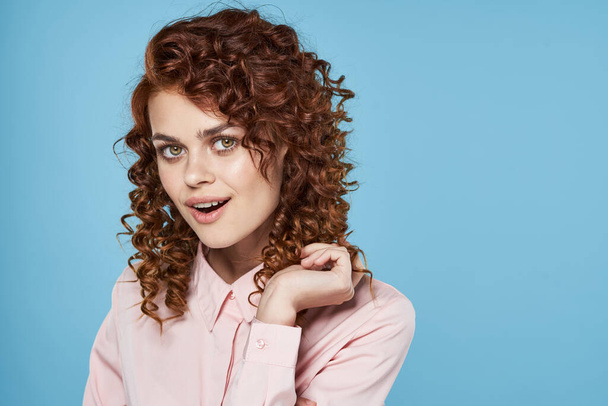 Portrait of   young beautiful woman with curly hair. Studio shot  - Φωτογραφία, εικόνα