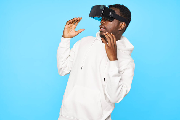young man wearing vr glasses in studio  - Photo, Image