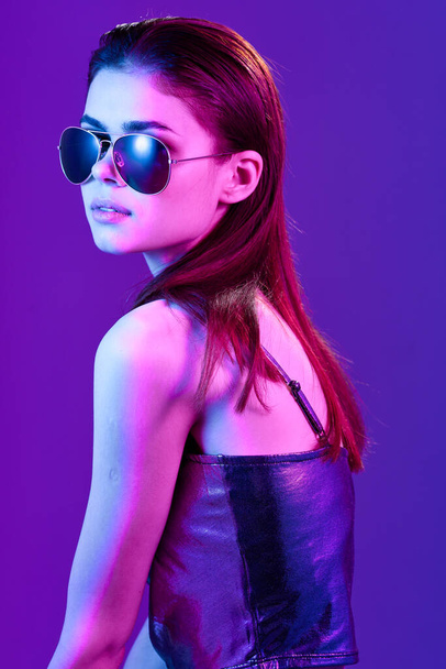 young beautiful fashion woman in sunglasses posing in studio - Фото, изображение