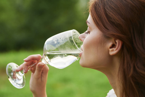 Young beautiful woman drinking wine  - Photo, Image