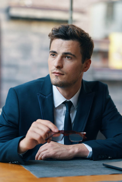 Young  businessman  with glasses   in the office  - Foto, immagini