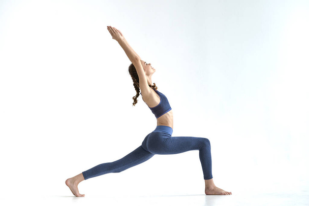 young beautiful woman practicing yoga - Photo, Image
