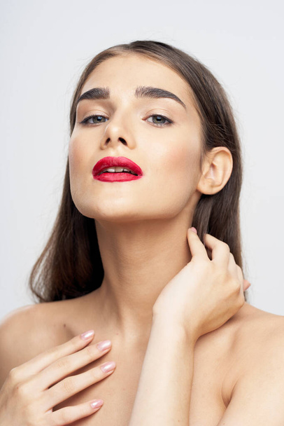 Portrait of young beautiful woman with  red lipstick on her lips. Beauty, fashion photography  - Foto, immagini