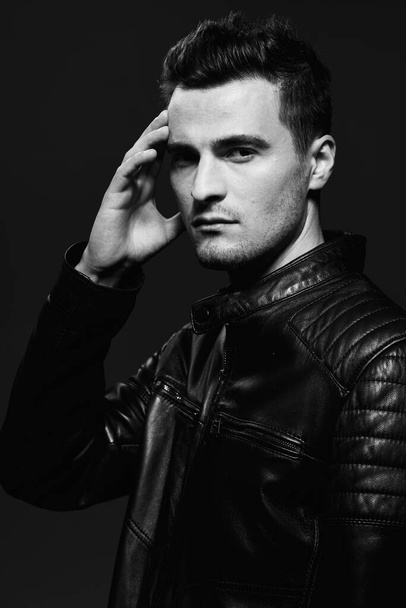 portrait of young handsome man in leather jacket. Studio shot. Fashion photography - Fotografie, Obrázek
