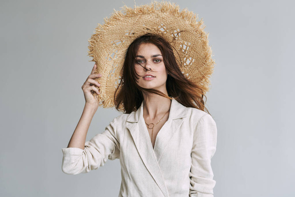 Portrait of young beautiful woman in straw hat. Fashion shot - Fotoğraf, Görsel