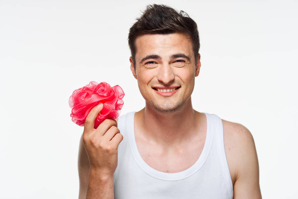 Young man with washcloth - Foto, Imagem