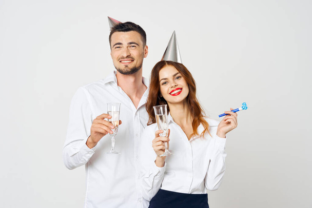 portrait of young beautiful couple celebrating birthday  with champagne - Foto, Imagen