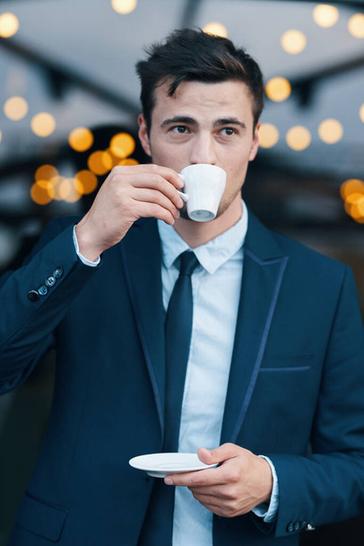 Young handsome  businessman in cafe  - Photo, image