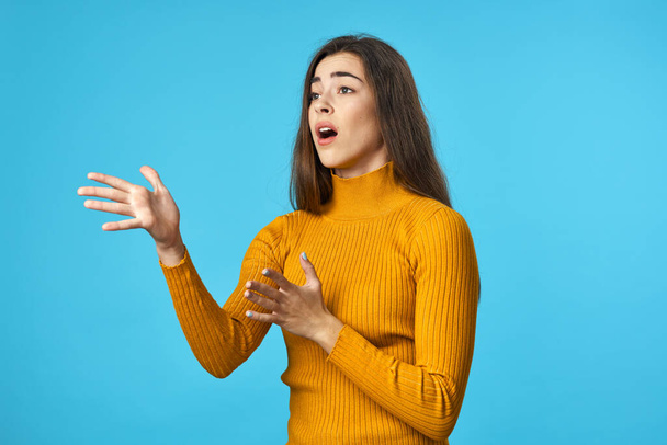 Young woman fan   in studio isolated on blue background  - Photo, Image