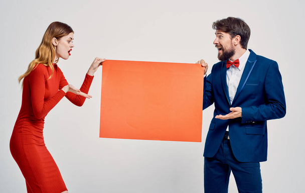 man and woman with   billboard in studio    - Photo, Image