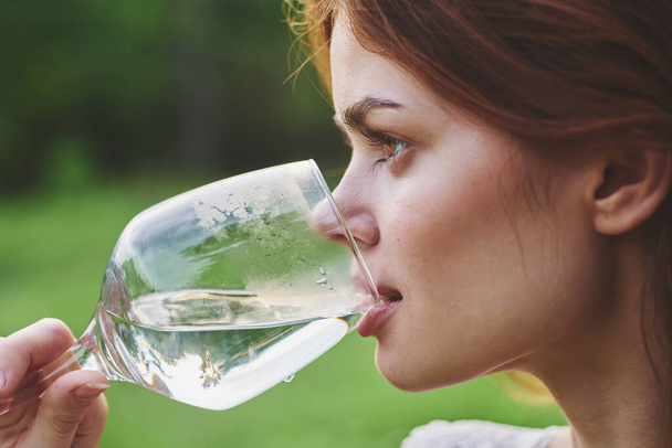 Young beautiful woman drinking wine  - Fotó, kép
