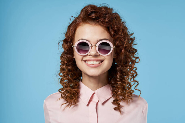 young beautiful woman wearing sunglasses - Photo, image