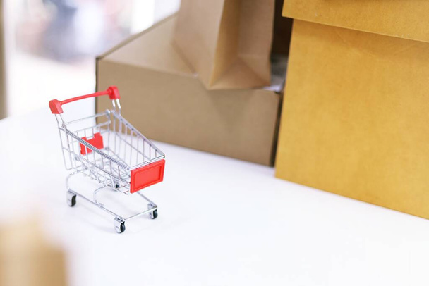 Shopping cart for Internet online shopping e-commerce online delivery service concept   - Fotó, kép