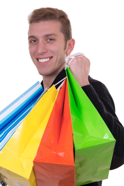 Smiling man with colorful shopping bags - Foto, Imagem