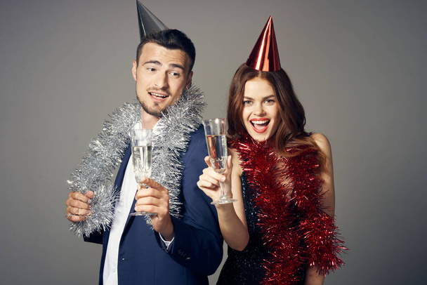 portrait of young beautiful couple celebrating birthday  with champagne - Fotó, kép