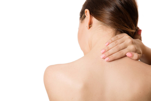 Frau Rückenschmerzen Nackenschmerzen. Rückansicht. Kopierschutz - Foto, Bild