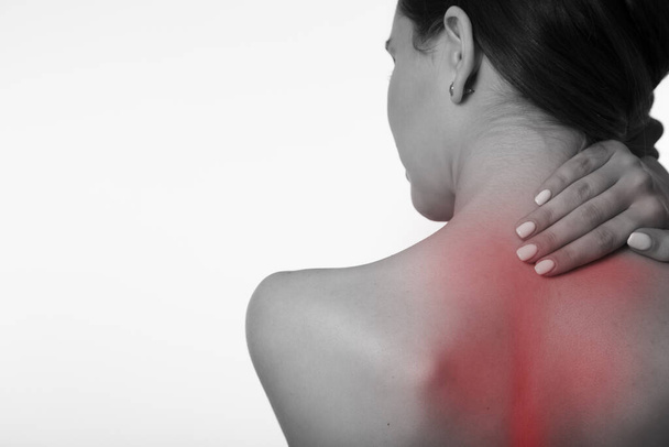 Frau Rückenschmerzen Nackenschmerzen. Rückansicht. Kopierschutz - Foto, Bild