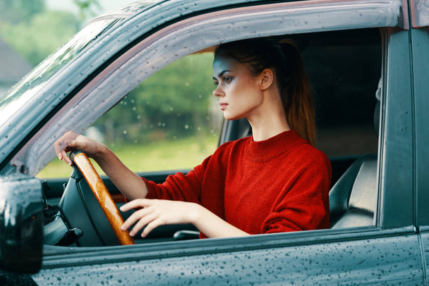 Young beautiful woman driver in the car - 写真・画像