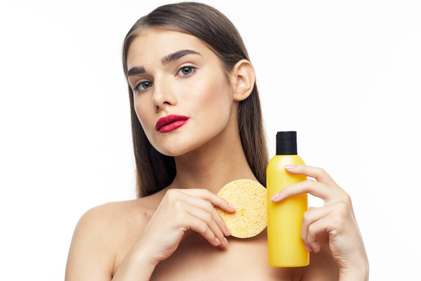 Young beautiful woman with sponge  - 写真・画像