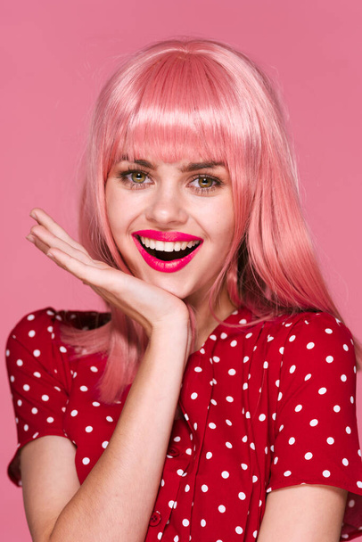 young beautiful woman in pink wig  posing in studio  - Fotoğraf, Görsel