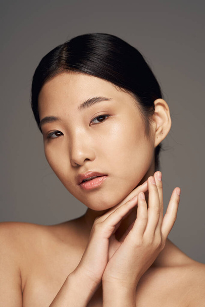 Portrait of young beautiful asian woman posing   isolated   - Photo, Image