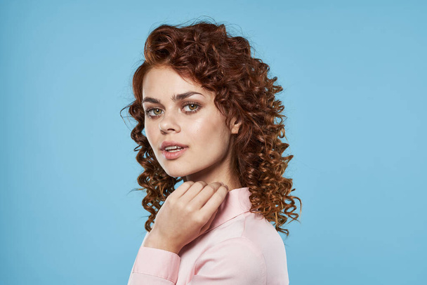 Portrait of   young beautiful woman with curly hair. Studio shot  - Fotografie, Obrázek