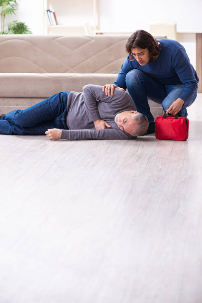 Grandfather and grandson in first aid concept - Fotografie, Obrázek
