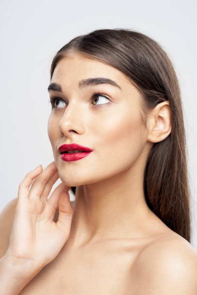 Portrait of young beautiful woman with  red lipstick on her lips. Beauty, fashion photography  - Foto, Imagen
